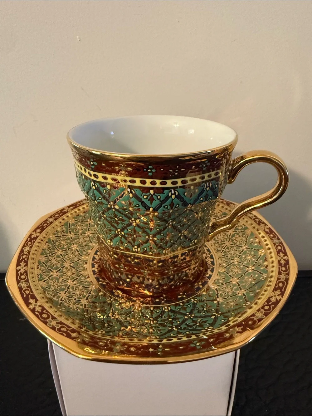 PIPATANA BENJARONG Green red and Gold Porcelain Teacup with Saucer.